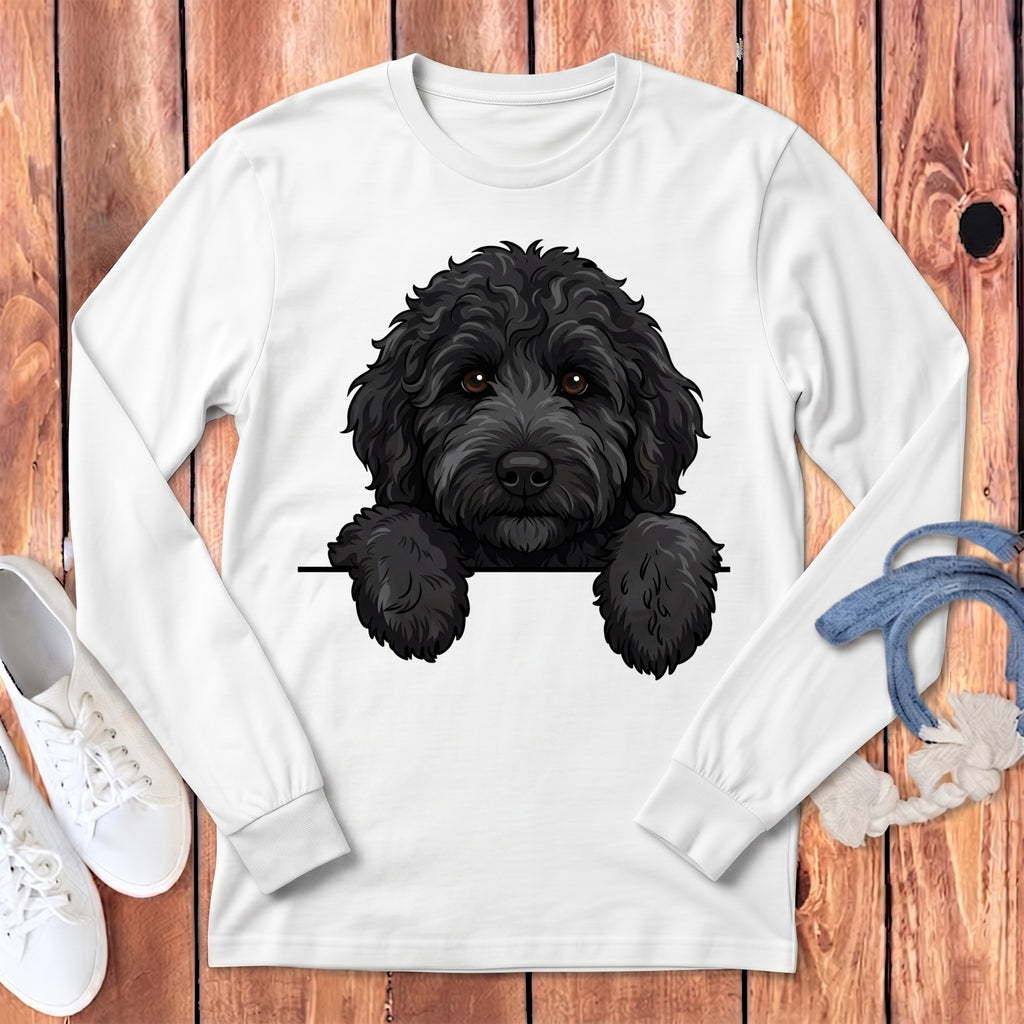 White long sleeve shirt with a black doodle dog graphic peeking over the front.