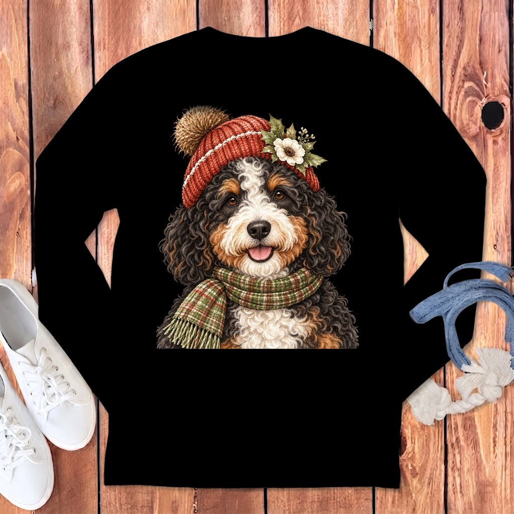 Bernese Mountain Dog wearing a knitted hat, scarf, and floral decoration.