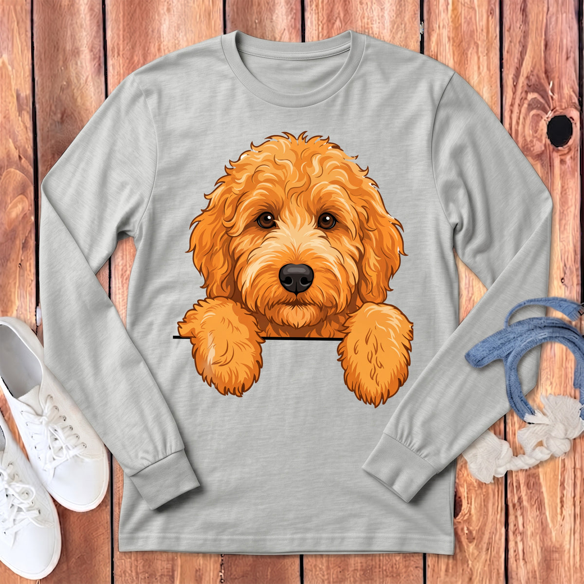 Light grey long-sleeve shirt with a cartoon goldendoodle dog peeking over the chest.