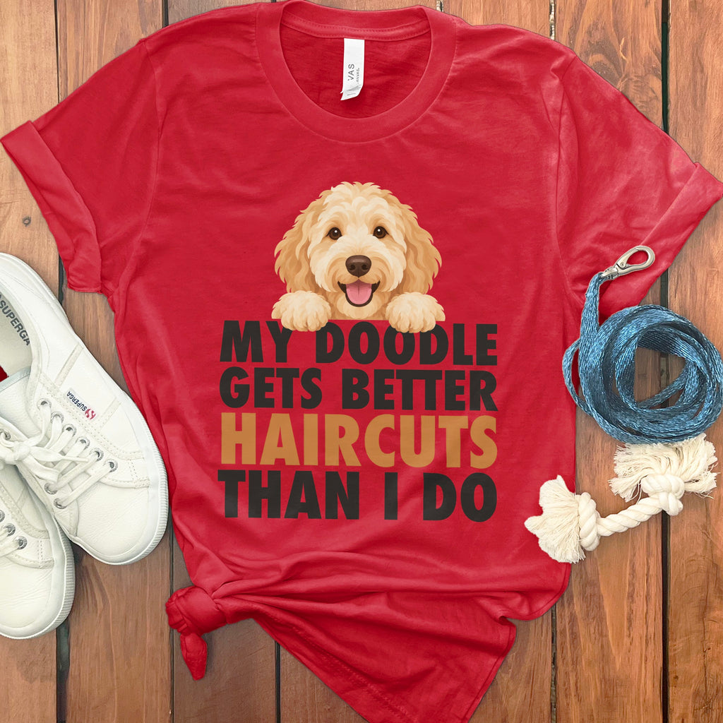Red t-shirt with a doodle dog graphic and the text "My Doodle Gets Better Haircuts Than I Do".