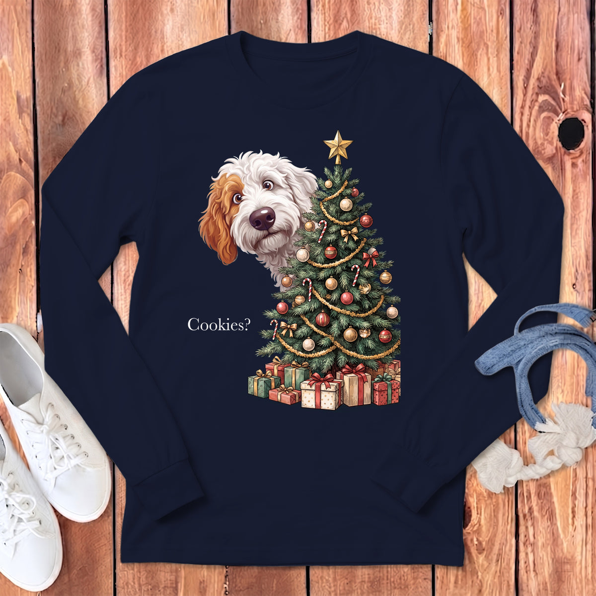 Fluffy dog peeks around a decorated Christmas tree and asks "Cookies?".