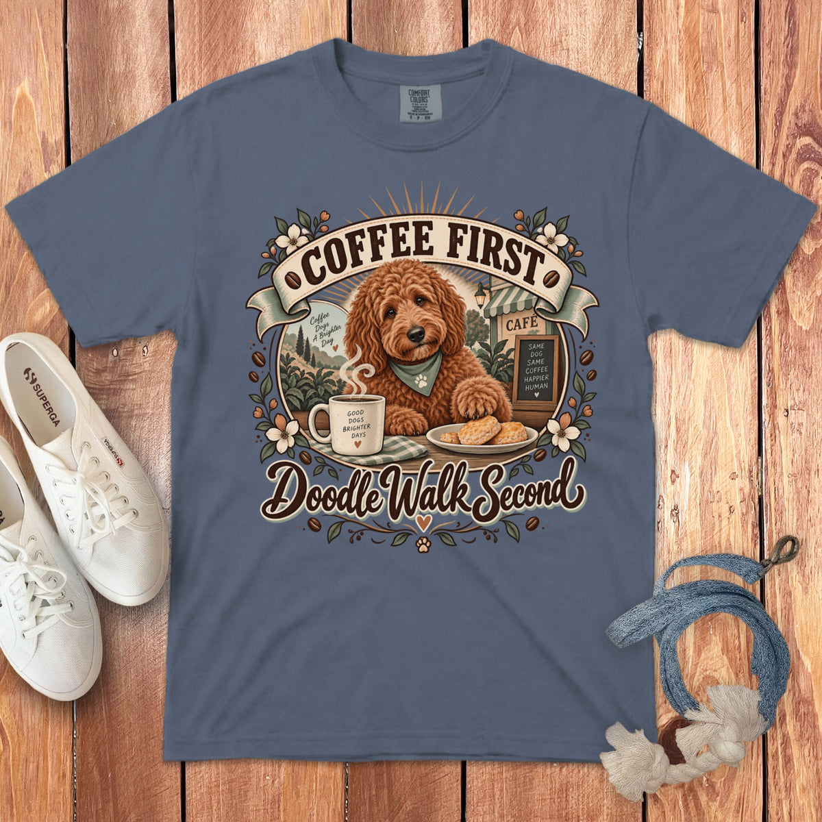 T-shirt graphic with doodle dog, coffee cup, cookies, and text "Coffee First Doodle Walk Second".