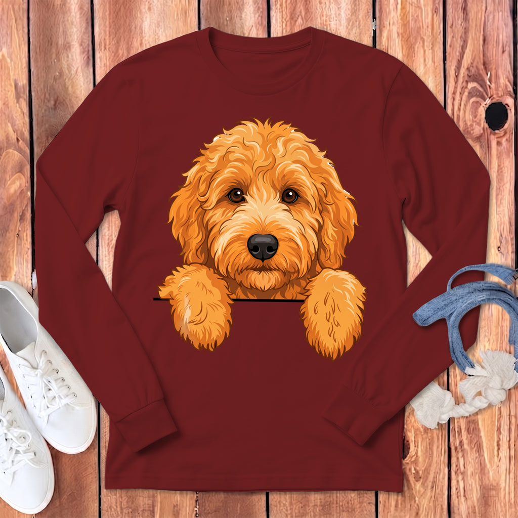 Maroon long-sleeve shirt with a golden doodle peeking over the chest.