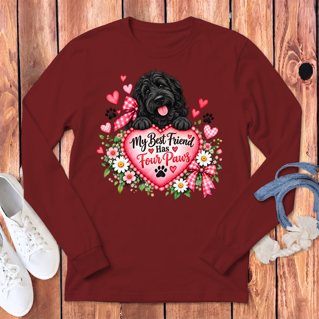 Maroon long-sleeve t-shirt featuring a graphic of a black dog with text that reads My Best Friend Has Four Paws.