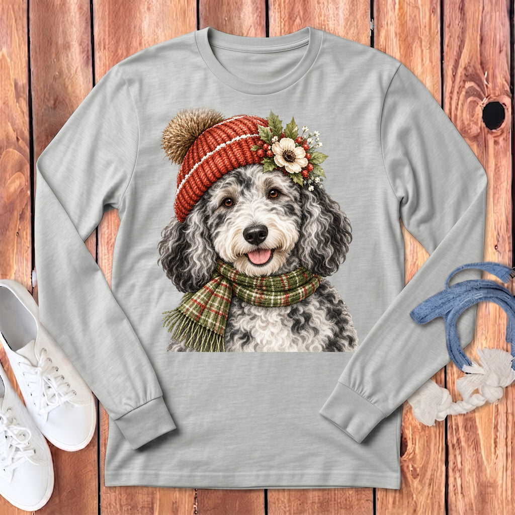 Grey long-sleeve shirt with a watercolor dog wearing a red knit hat and scarf.