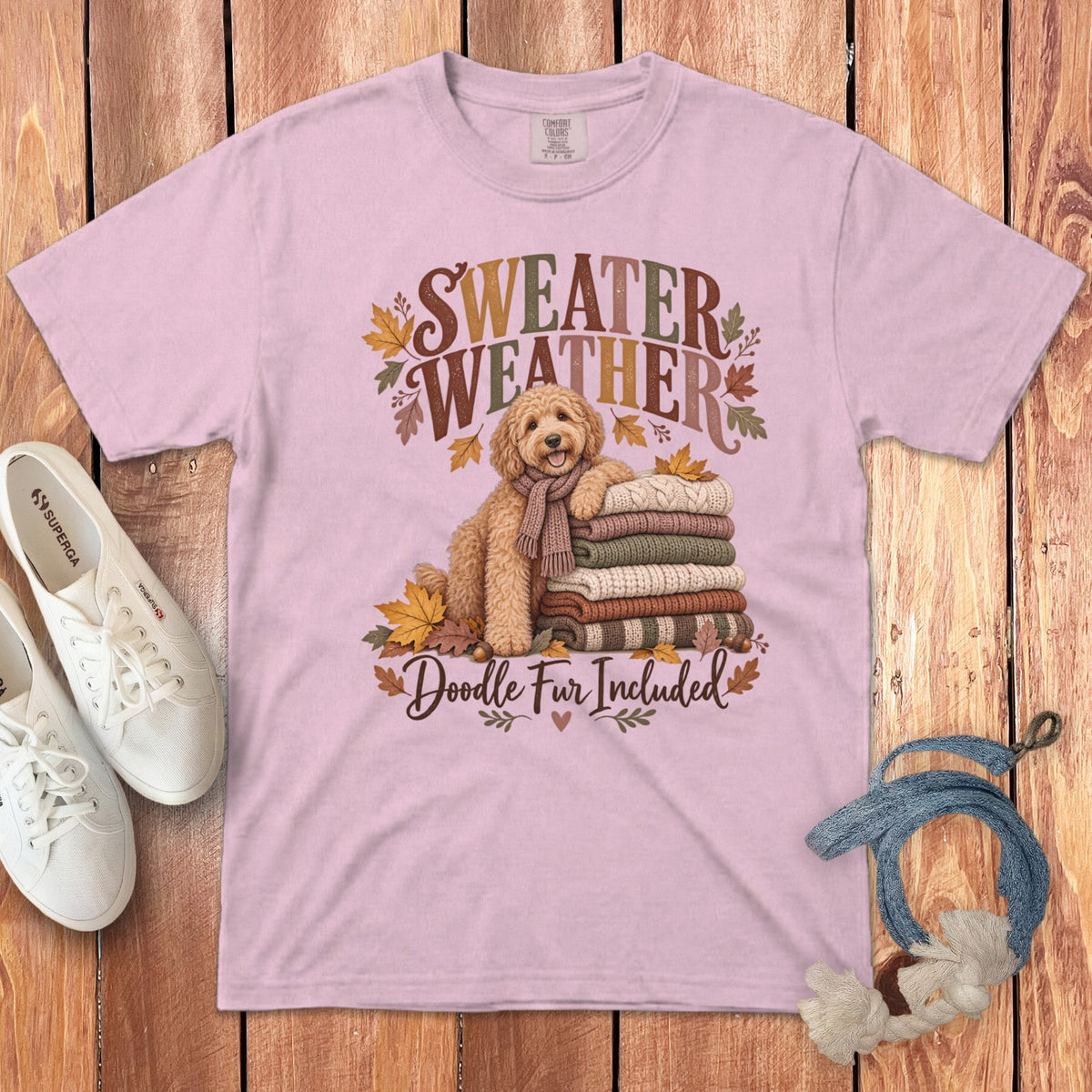 Pink t-shirt with "Sweater Weather Doodle Fur Included" text and doodle dog graphic.