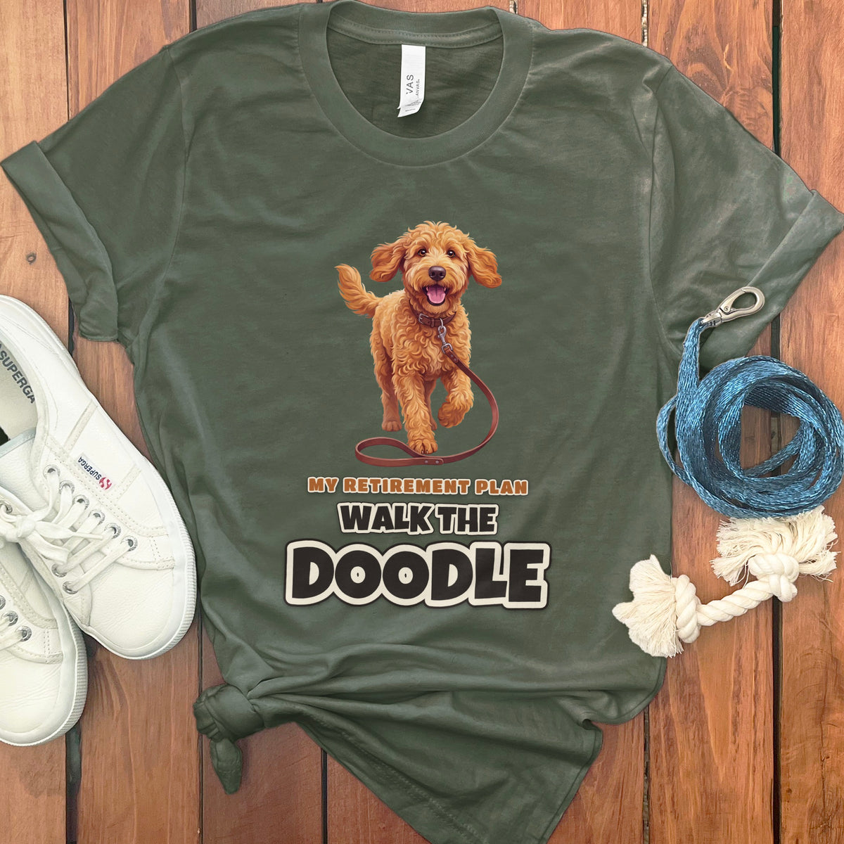 Green t-shirt with doodle dog graphic and text "My Retirement Plan Walk the Doodle".