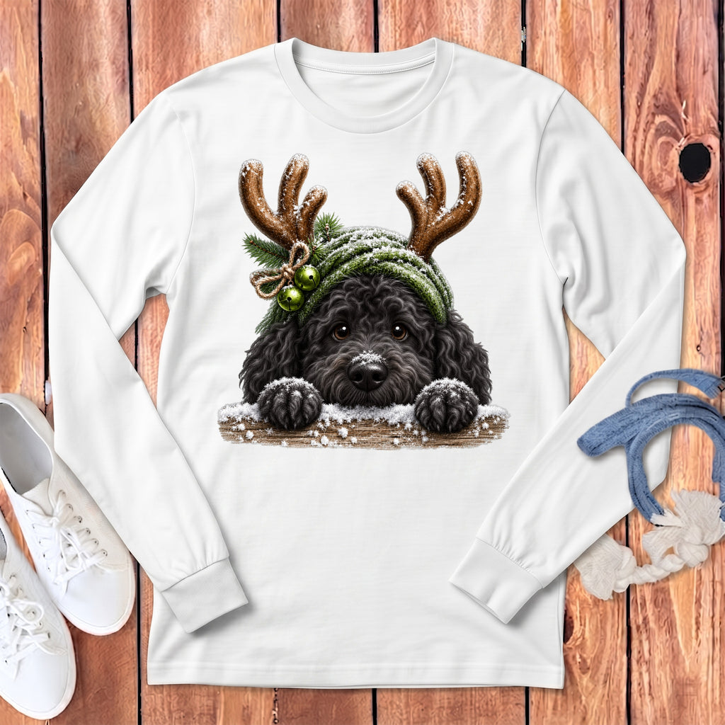White long-sleeve shirt with a Christmas-themed black poodle graphic and white sneakers.