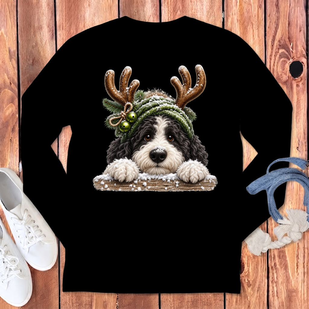 Black long-sleeve shirt with a Bernese Mountain Dog wearing a festive hat and antlers.