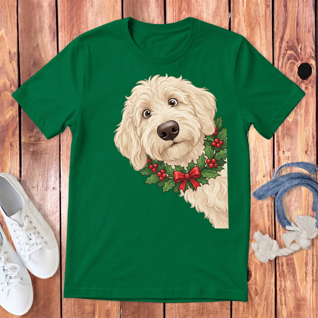 Green t-shirt with a fluffy dog wearing a holly wreath and red bow.