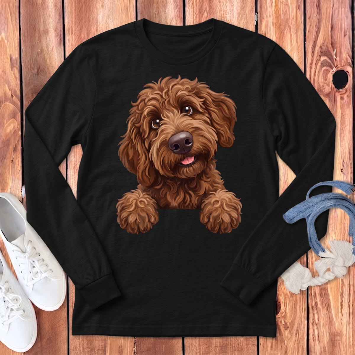 Black long sleeve t-shirt with a brown doodle dog graphic and white sneakers.