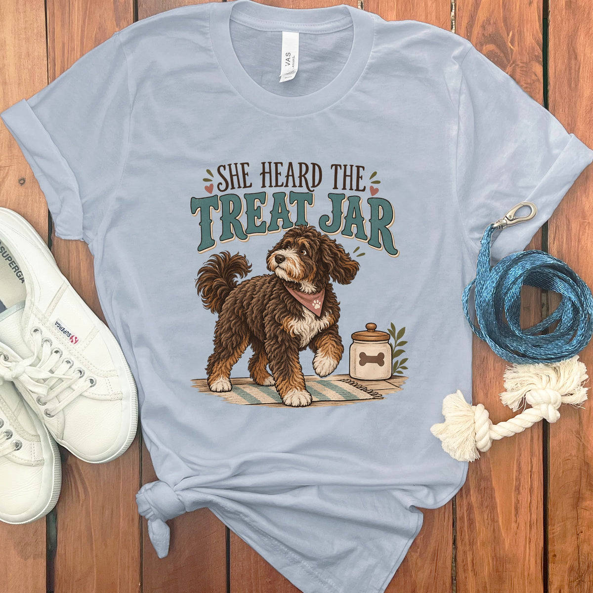 Light blue t-shirt with "She Heard The Treat Jar" and a dog graphic.