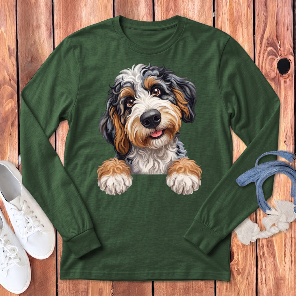 Long sleeve green shirt with a playful tricolor doodle dog graphic.