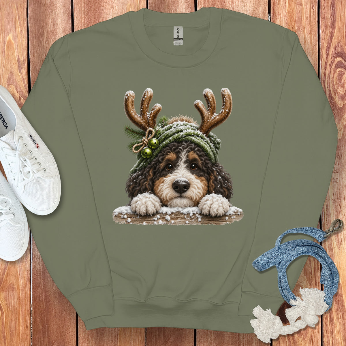 Crewneck sweatshirt with a Bernese Mountain Dog wearing antlers and a winter hat.