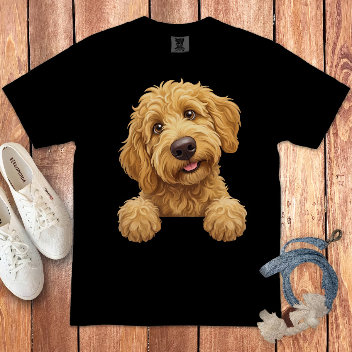 Black t-shirt with a golden doodle puppy illustration peeking over a collar.