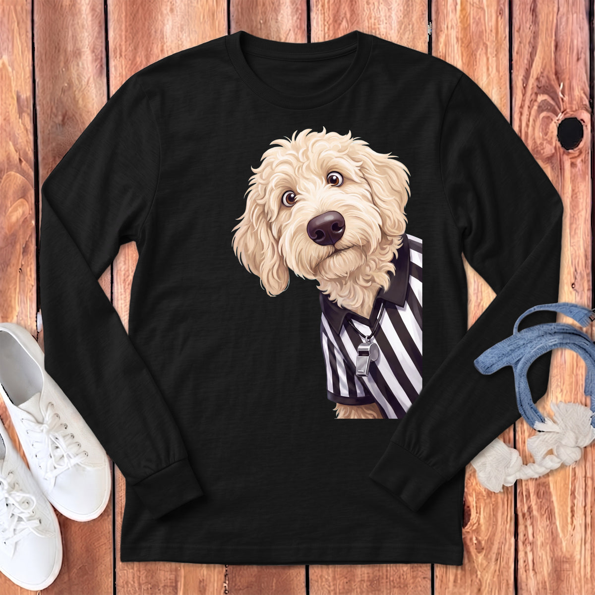 Black long-sleeve shirt with a doodle dog wearing a referee shirt and whistle.