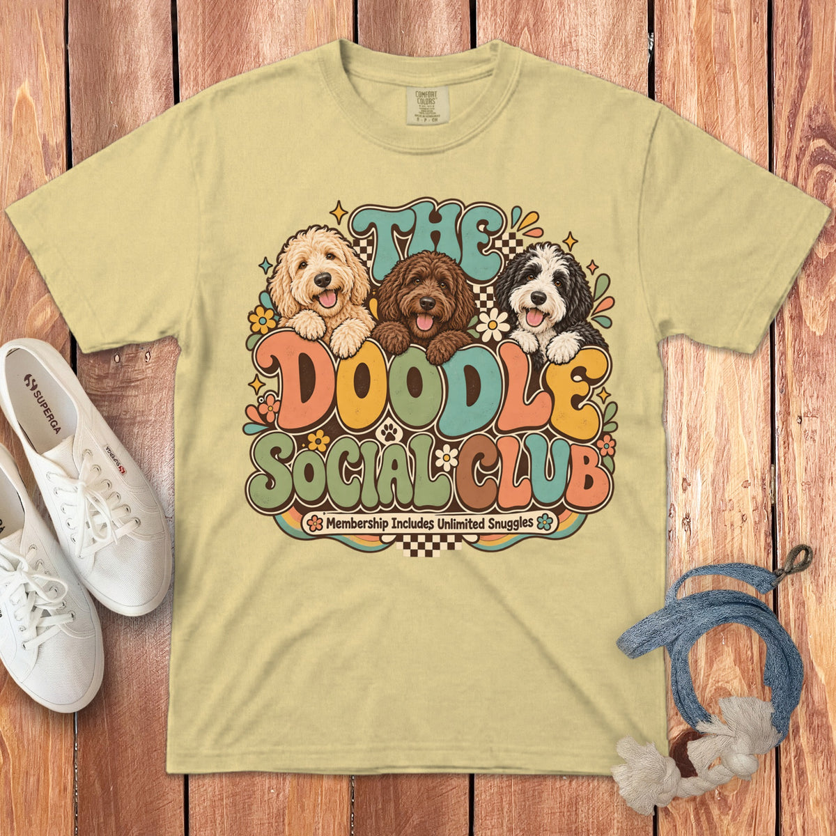 Light yellow t-shirt with "The Doodle Social Club" graphic and three doodles.