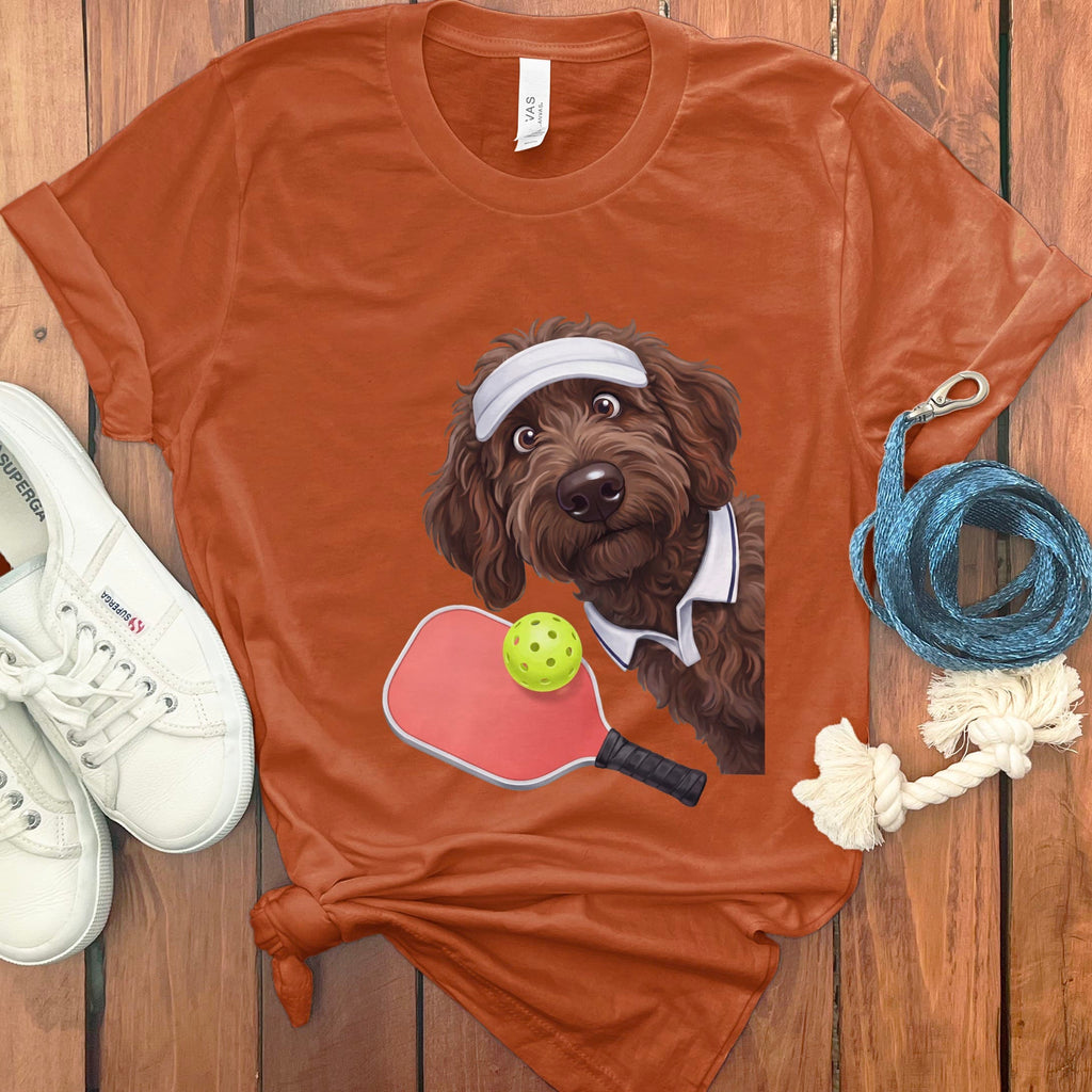 Chocolate Goldendoodle Pickleball Player T-Shirt in Autumn / S by Puppy Jo
