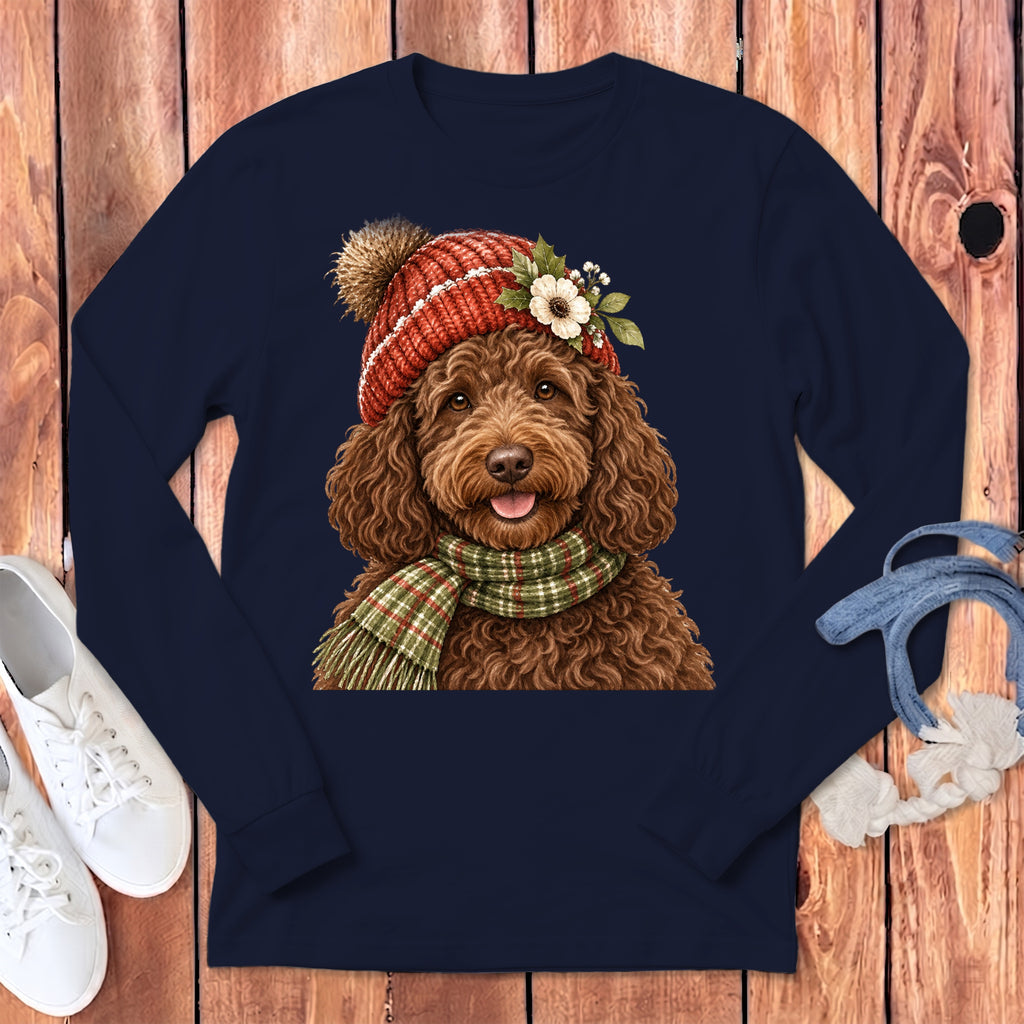 Brown doodle dog wearing a red knit hat and plaid scarf with flowers