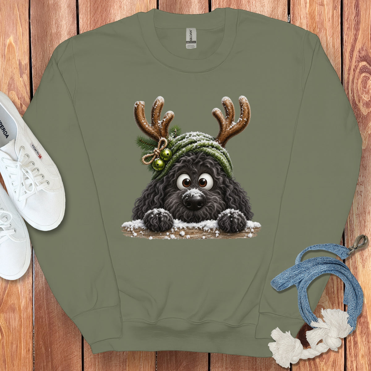Olive green sweatshirt with a cute black dog wearing reindeer antlers.