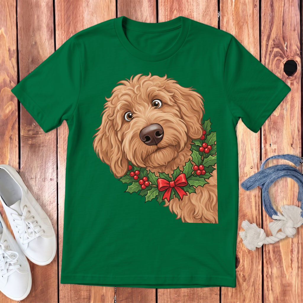 Green t-shirt with a doodle dog wearing a holly and berry wreath with a red bow.