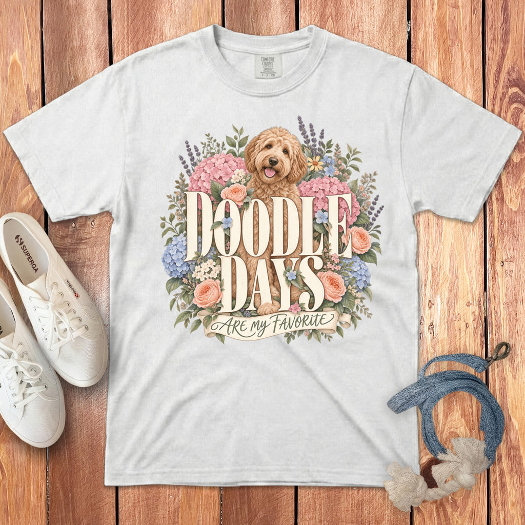 White t-shirt with doodle dog and floral design reading "Doodle Days Are My Favorite."