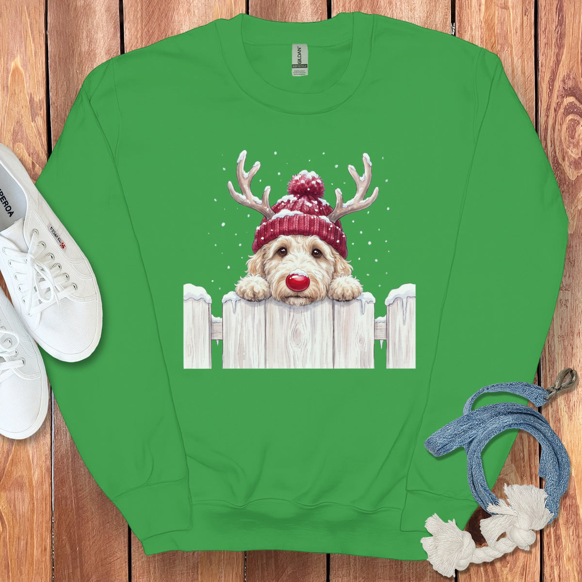 Green crewneck sweatshirt with a dog wearing reindeer antlers and a red hat.