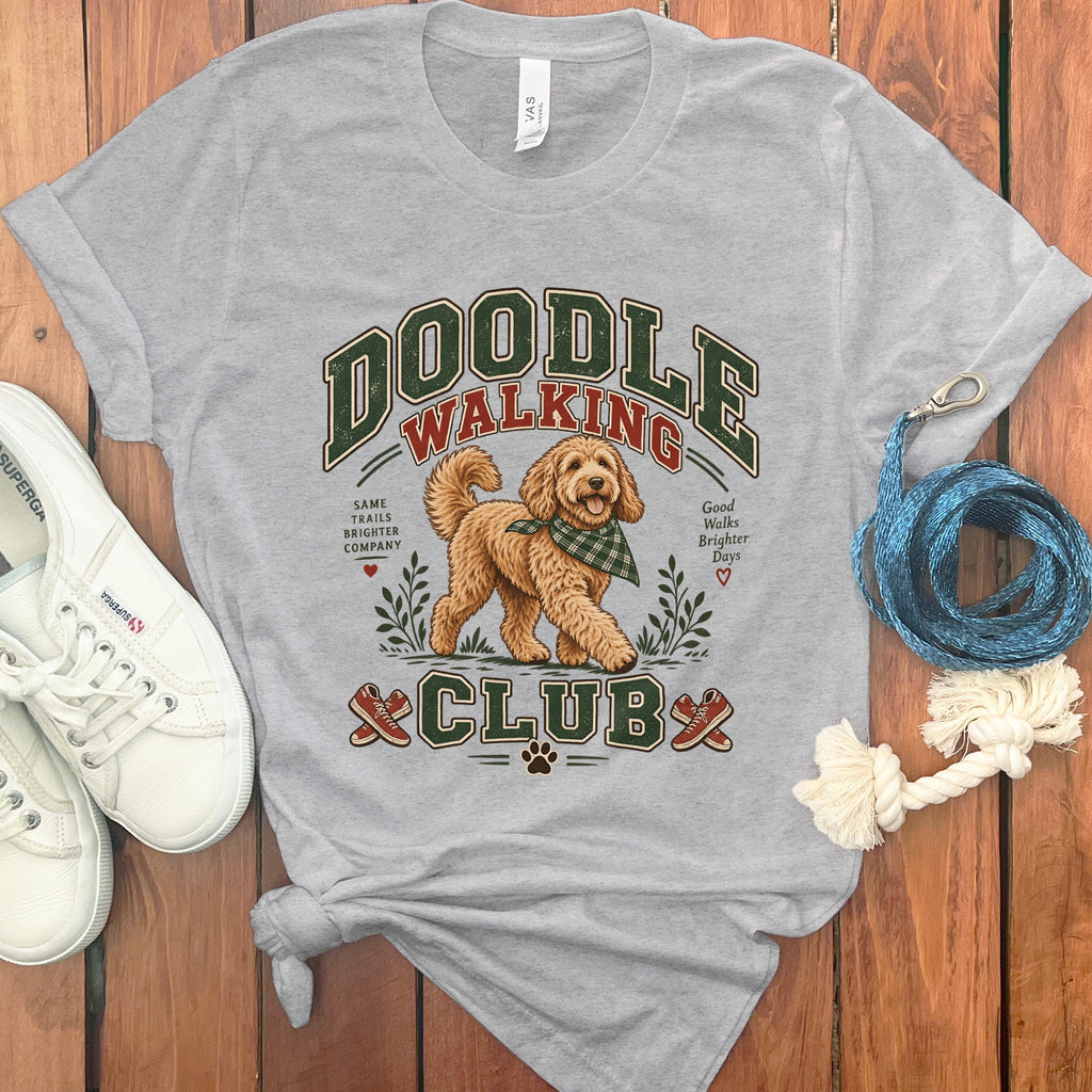 Grey t-shirt with Doodle Walking Club graphic featuring a dog and text.