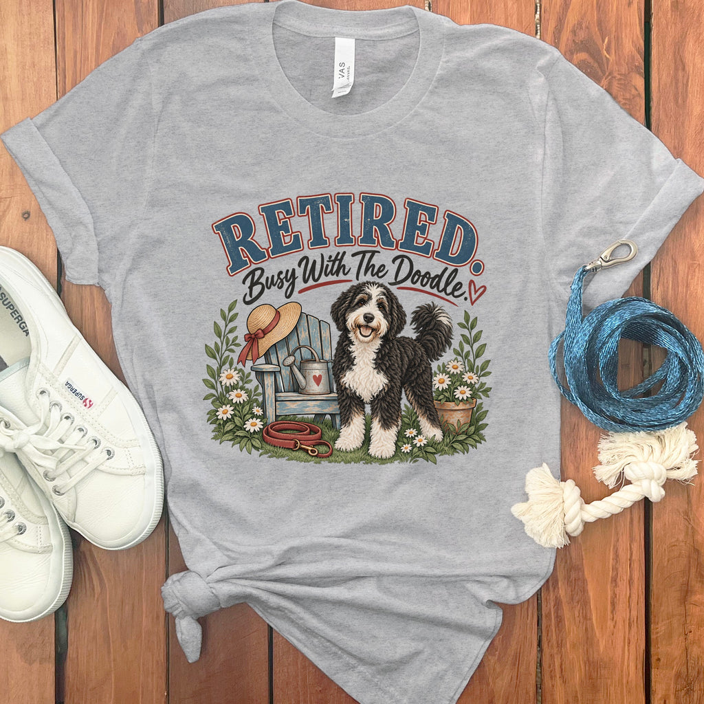 Grey t-shirt with "Retired Busy With The Doodle" text and doodle dog graphic.
