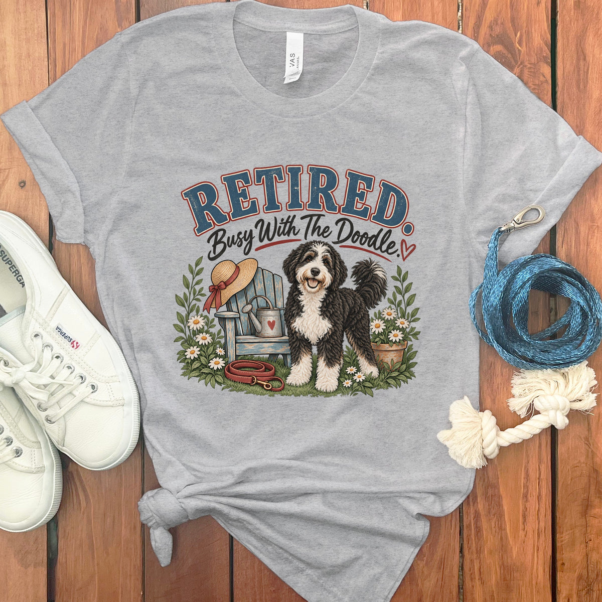 Grey t-shirt with "Retired Busy With The Doodle" text and doodle dog graphic.