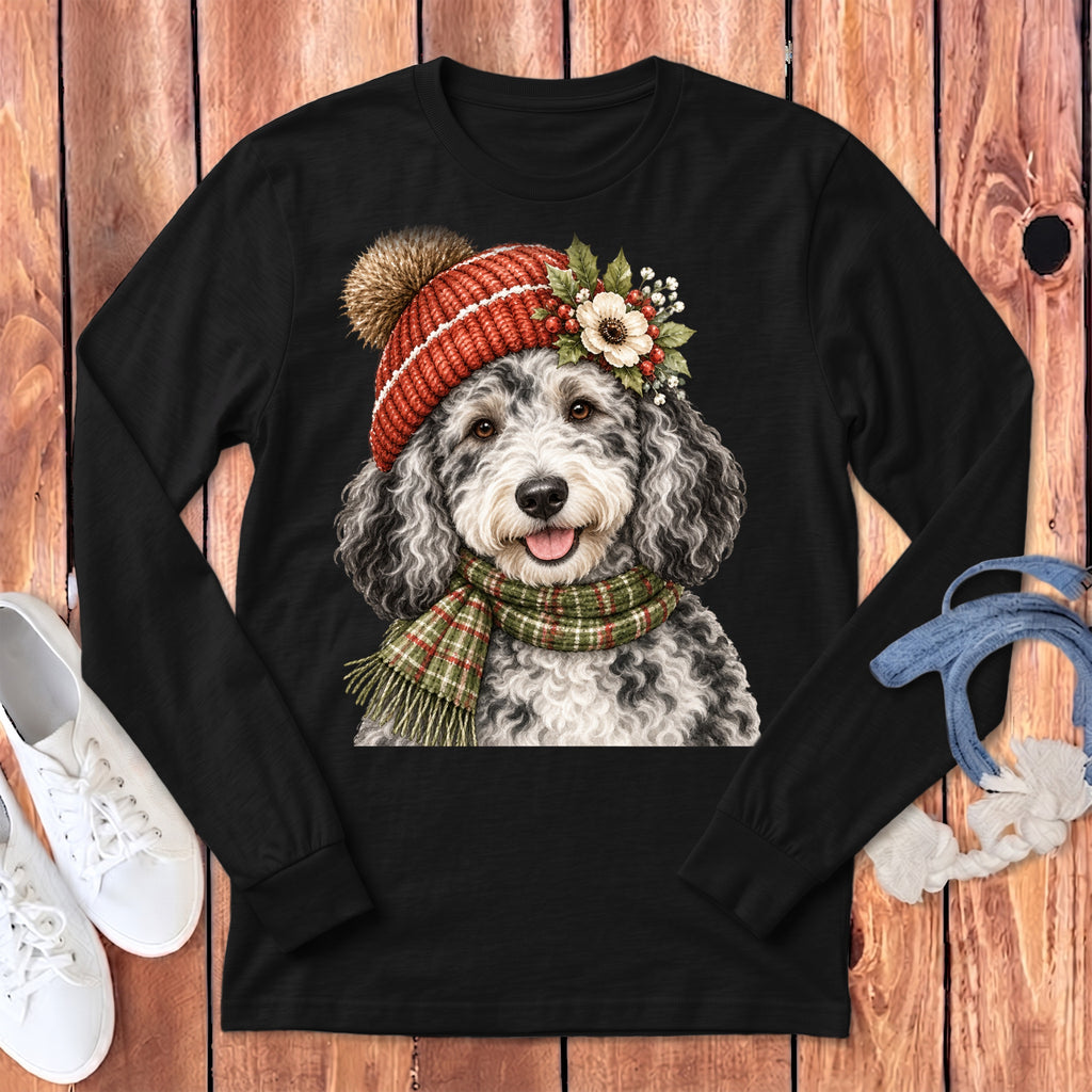 Black long-sleeve shirt with a fluffy dog wearing a festive hat and scarf.
