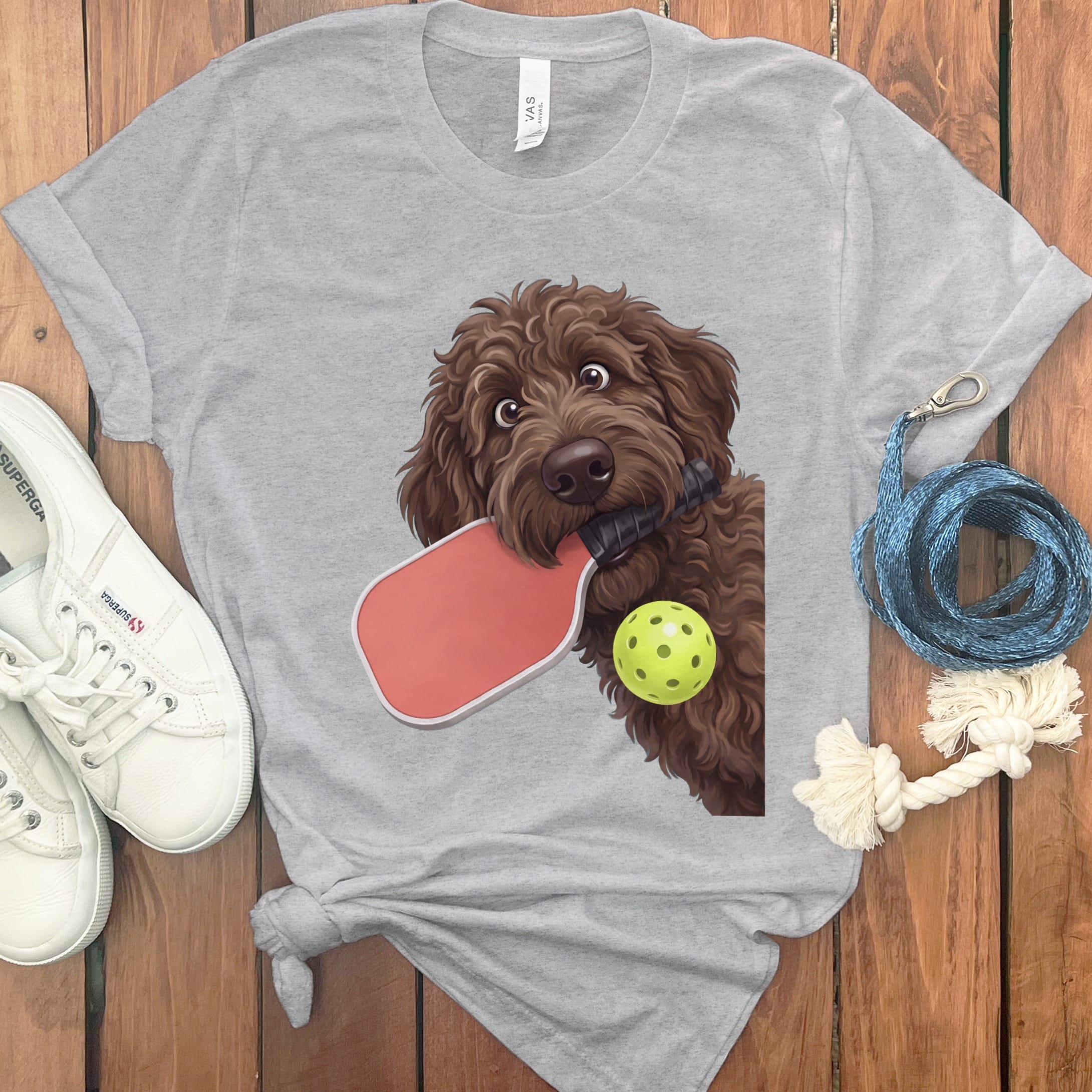 Chocolate Goldendoodle Pickleball T-Shirt in Athletic Heather / S by Puppy Jo