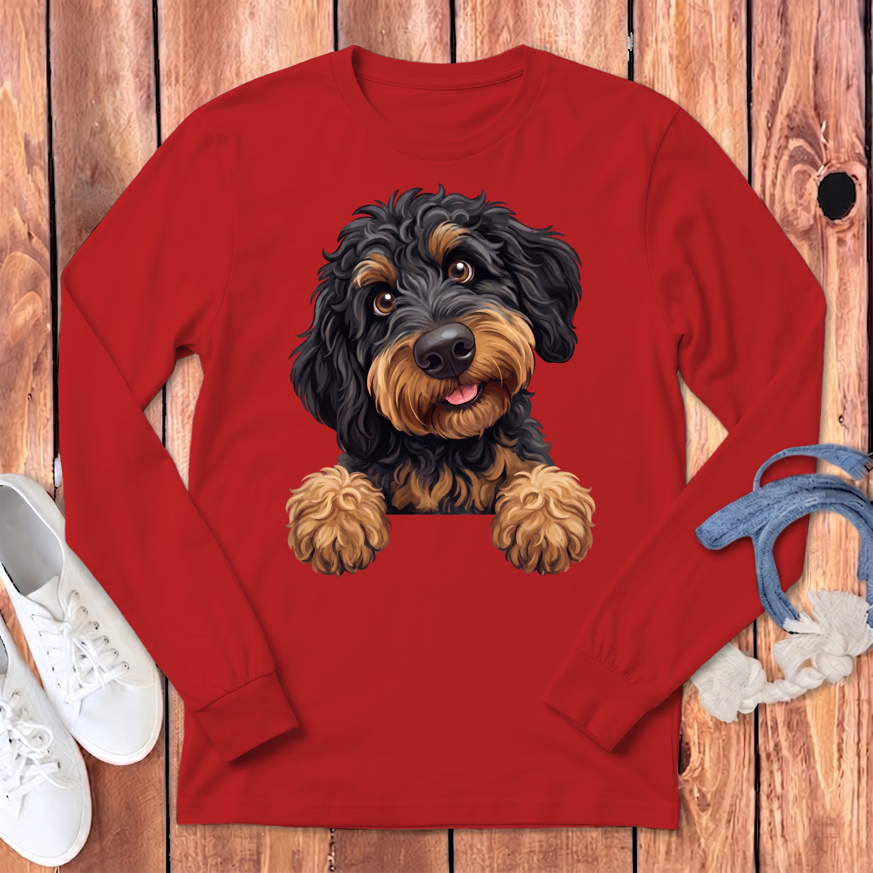 Red long-sleeve shirt with a doodle dog illustration on the front.