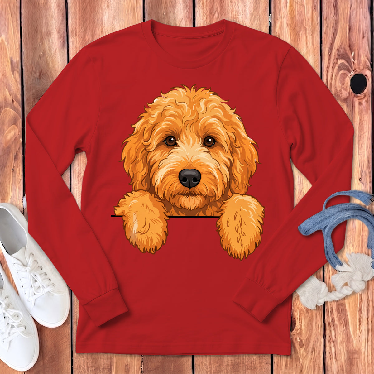 Red long sleeve t-shirt featuring a cartoon golden doodle peeking over the front.