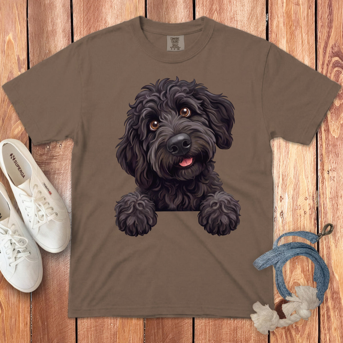 Brown t-shirt with a black doodle dog illustration on the front.