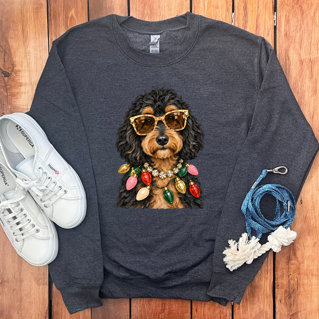 Dark gray sweatshirt with a printed image of a dog wearing sunglasses and Christmas lights.