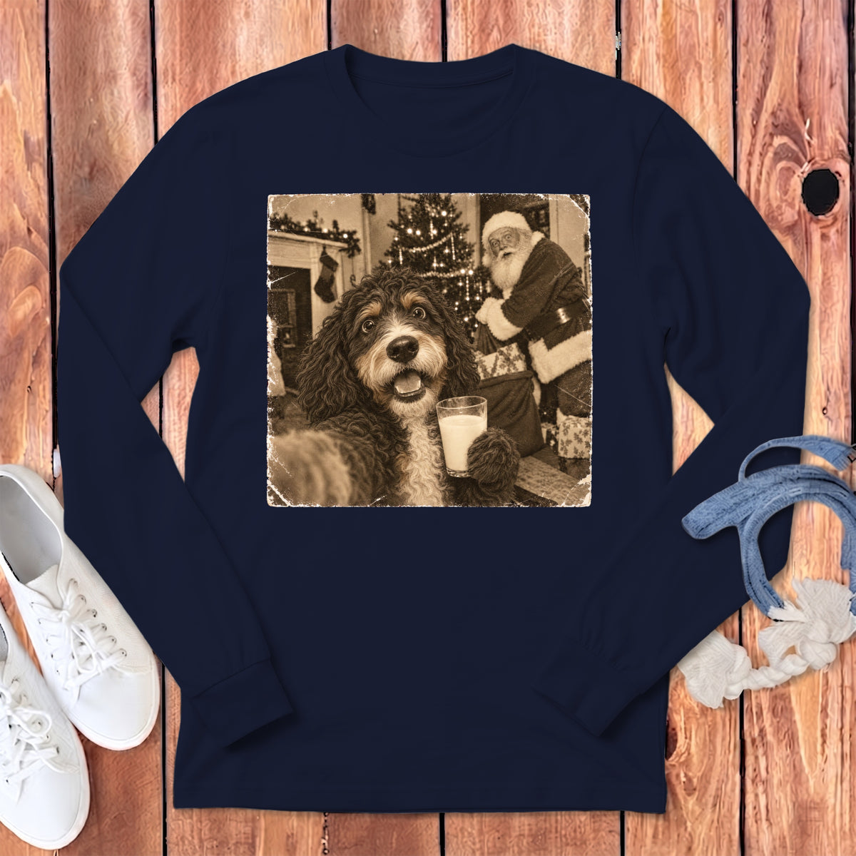 Dark blue long-sleeve t-shirt with a vintage graphic of a dog holding a glass of milk in front of Santa Claus.