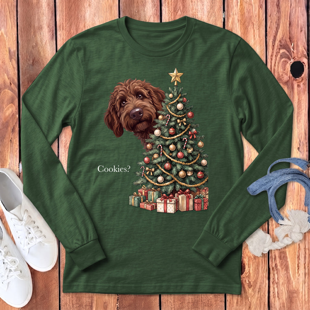 Brown dog peeking at Christmas tree with presents and "Cookies?" text.