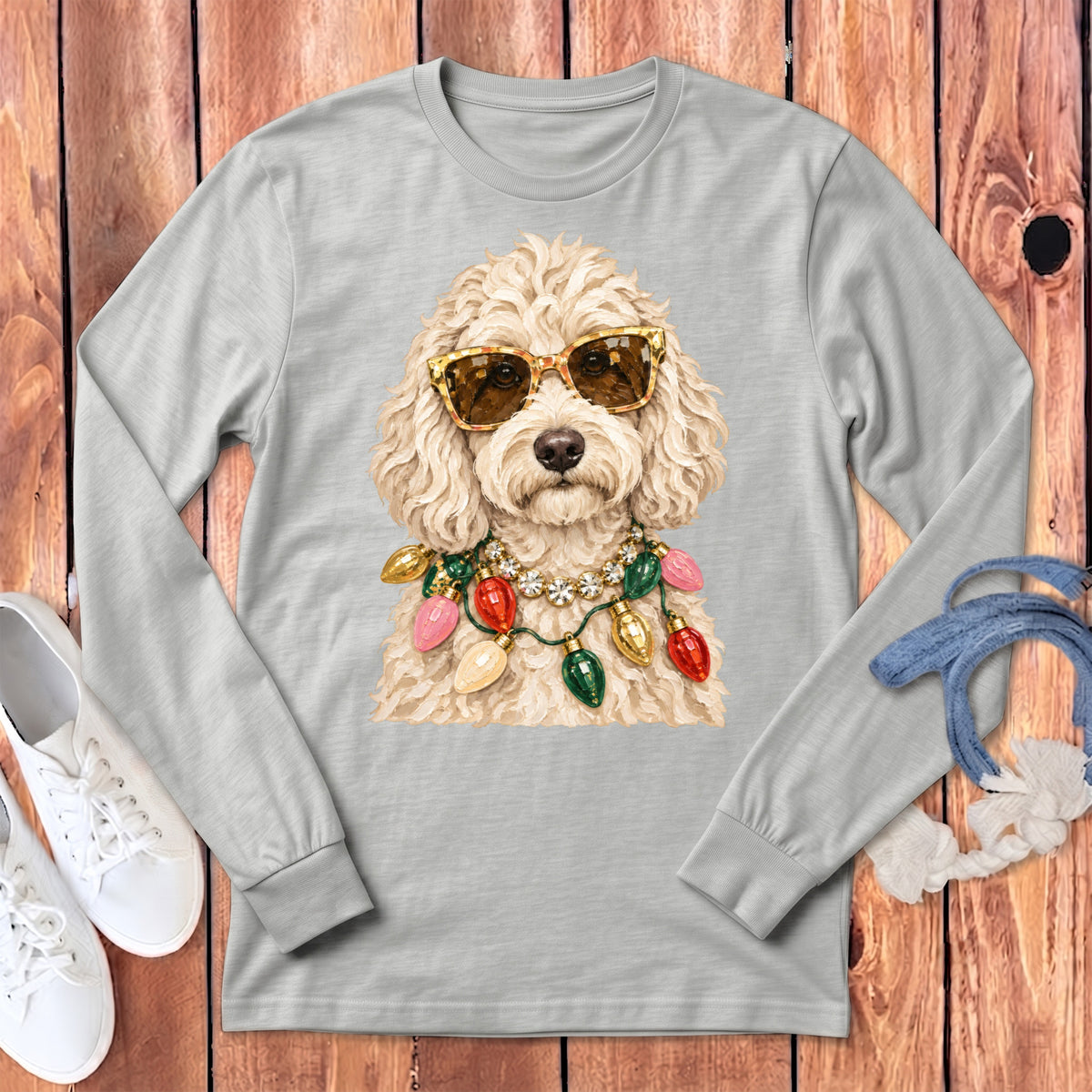Light gray long sleeve shirt with a doodle dog wearing sunglasses and a Christmas light necklace.