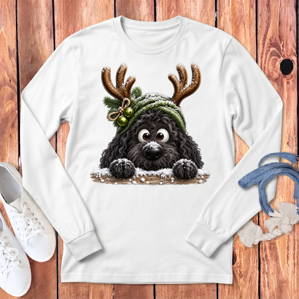 White long-sleeve shirt featuring a cartoon black dog wearing reindeer antlers and a green beanie.
