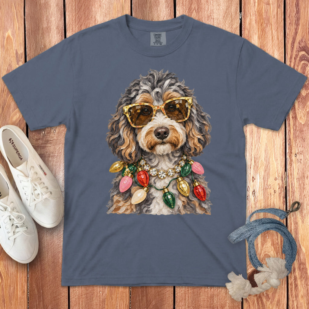 Graphic t-shirt with a dog wearing sunglasses and a string of Christmas lights.