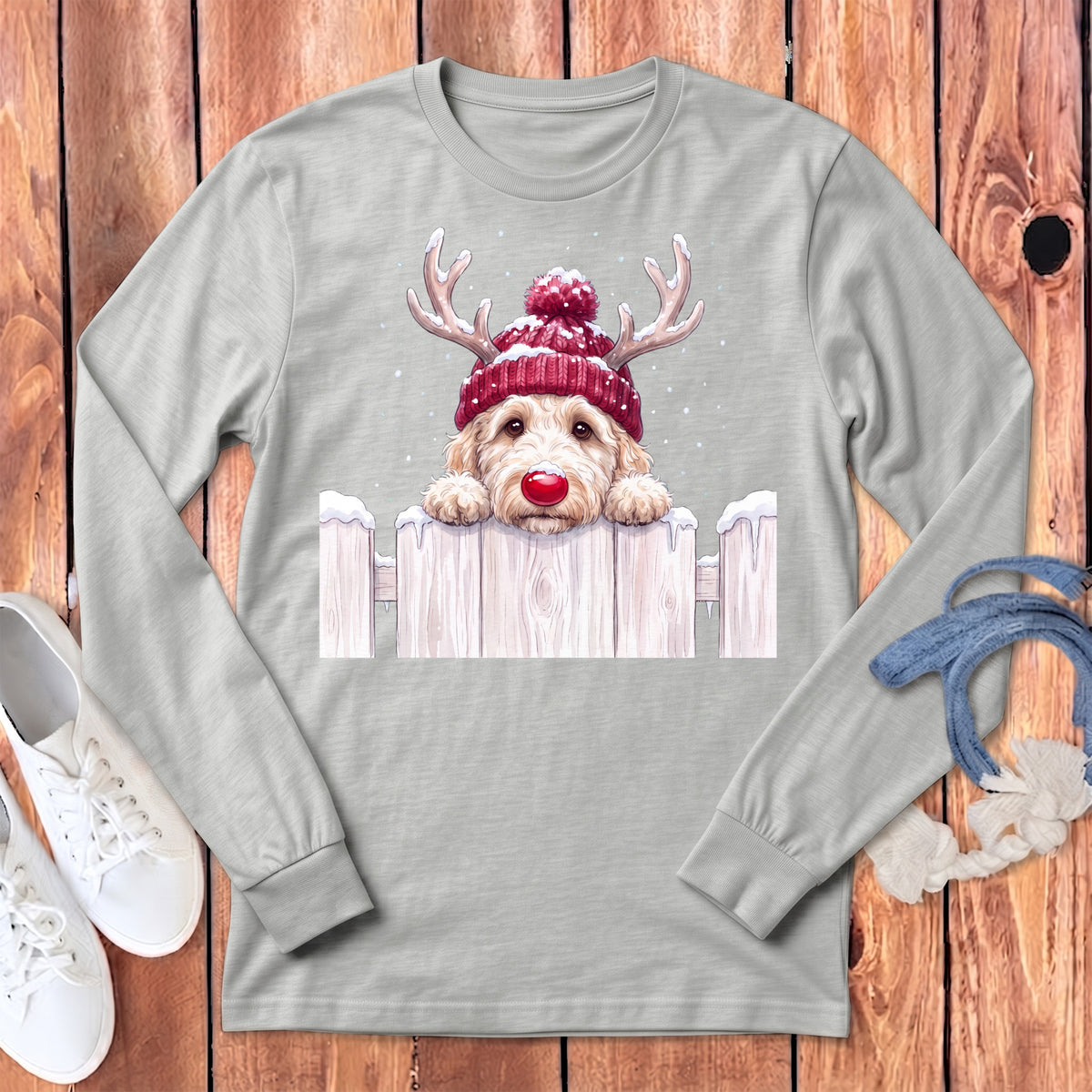 Light gray long-sleeve shirt with a doodle dog wearing antlers and a red hat.