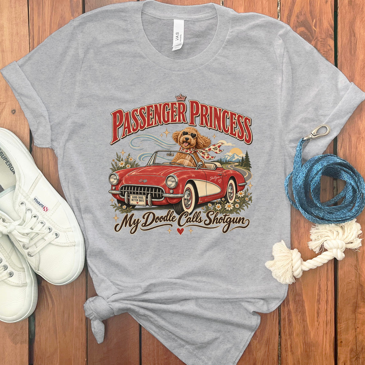 Grey t-shirt with "Passenger Princess" and a dog driving a red convertible.