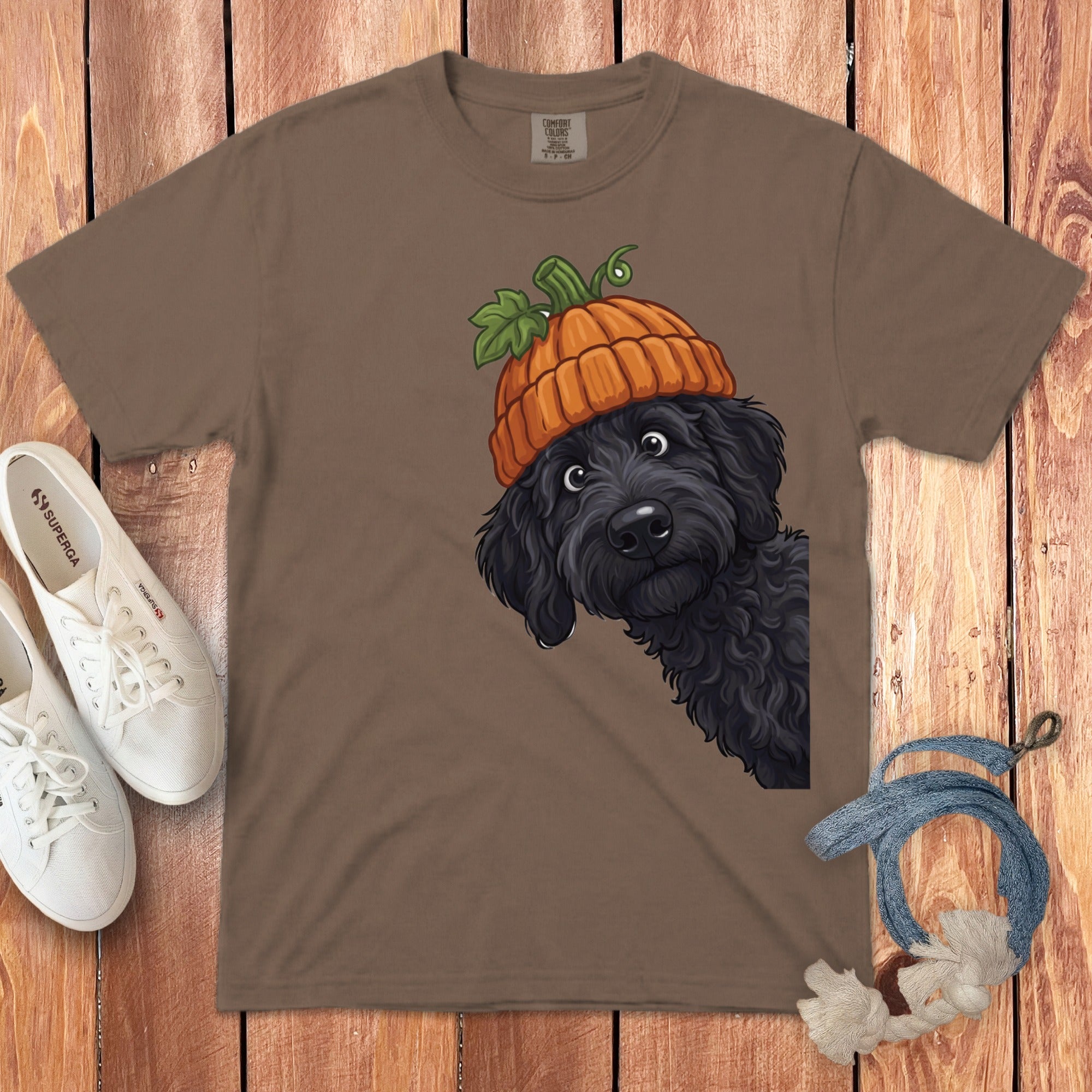 Brown t-shirt with black dog wearing a pumpkin hat graphic.