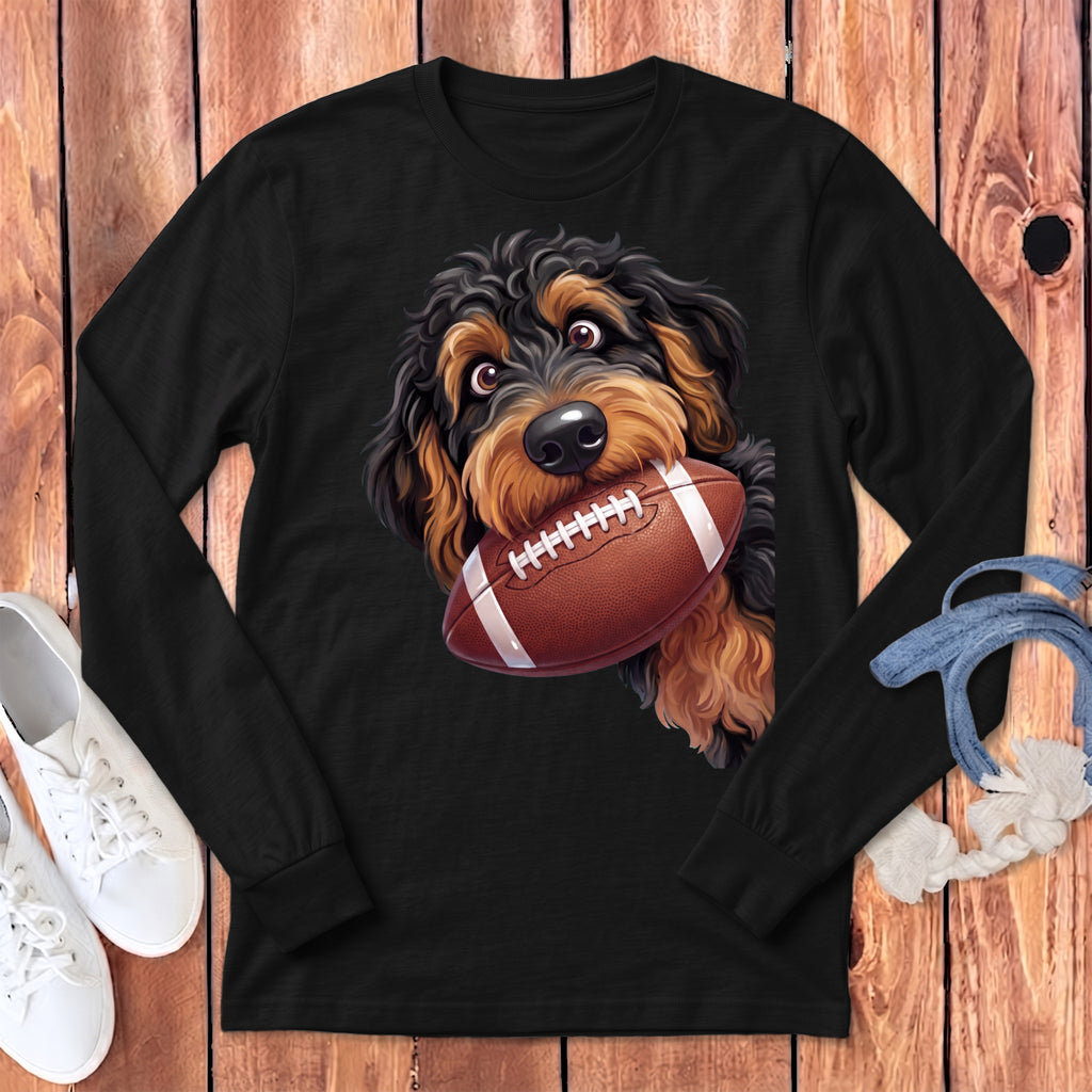 Black long sleeve shirt with a doodle dog holding a football.