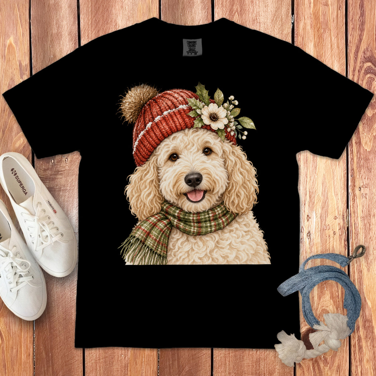 Black t-shirt with a watercolor doodle wearing a knit hat and scarf.