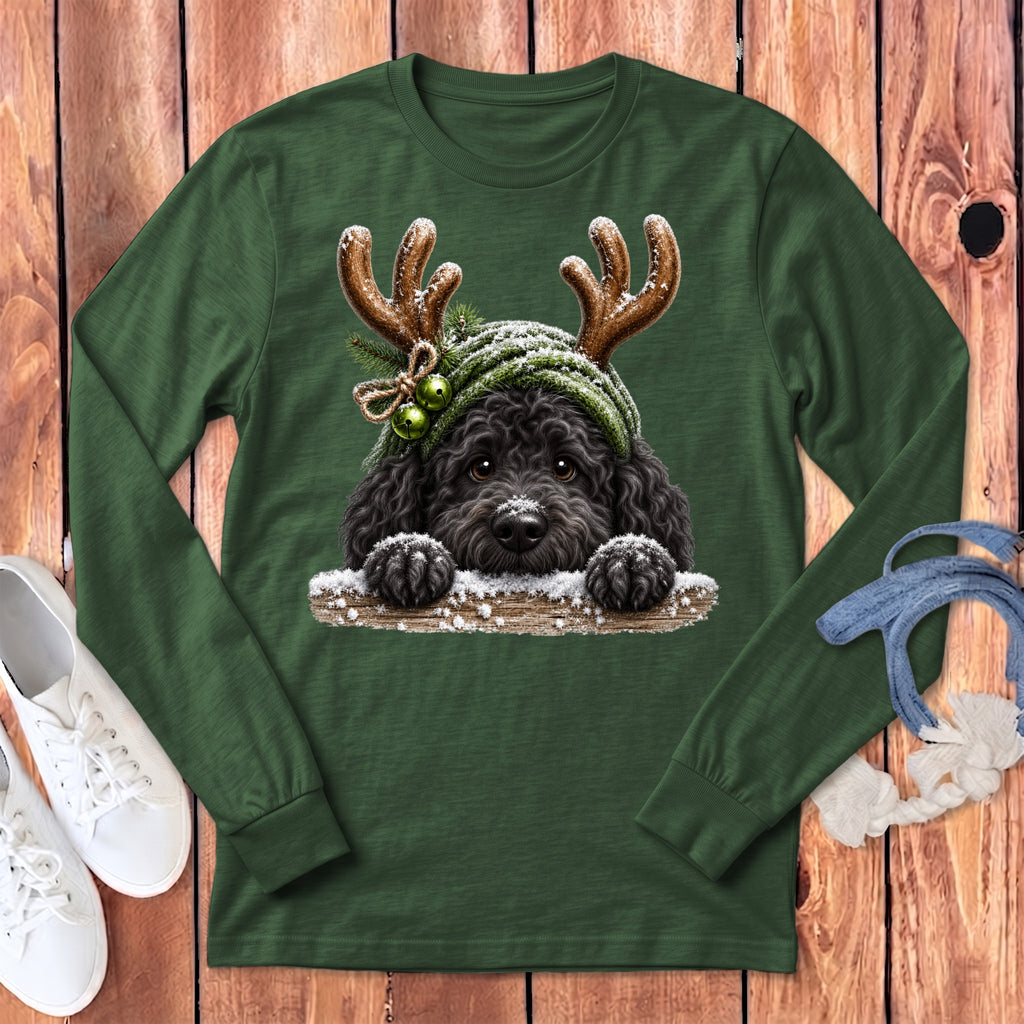 Dark green long-sleeved shirt with a black poodle wearing antlers and a knit hat.