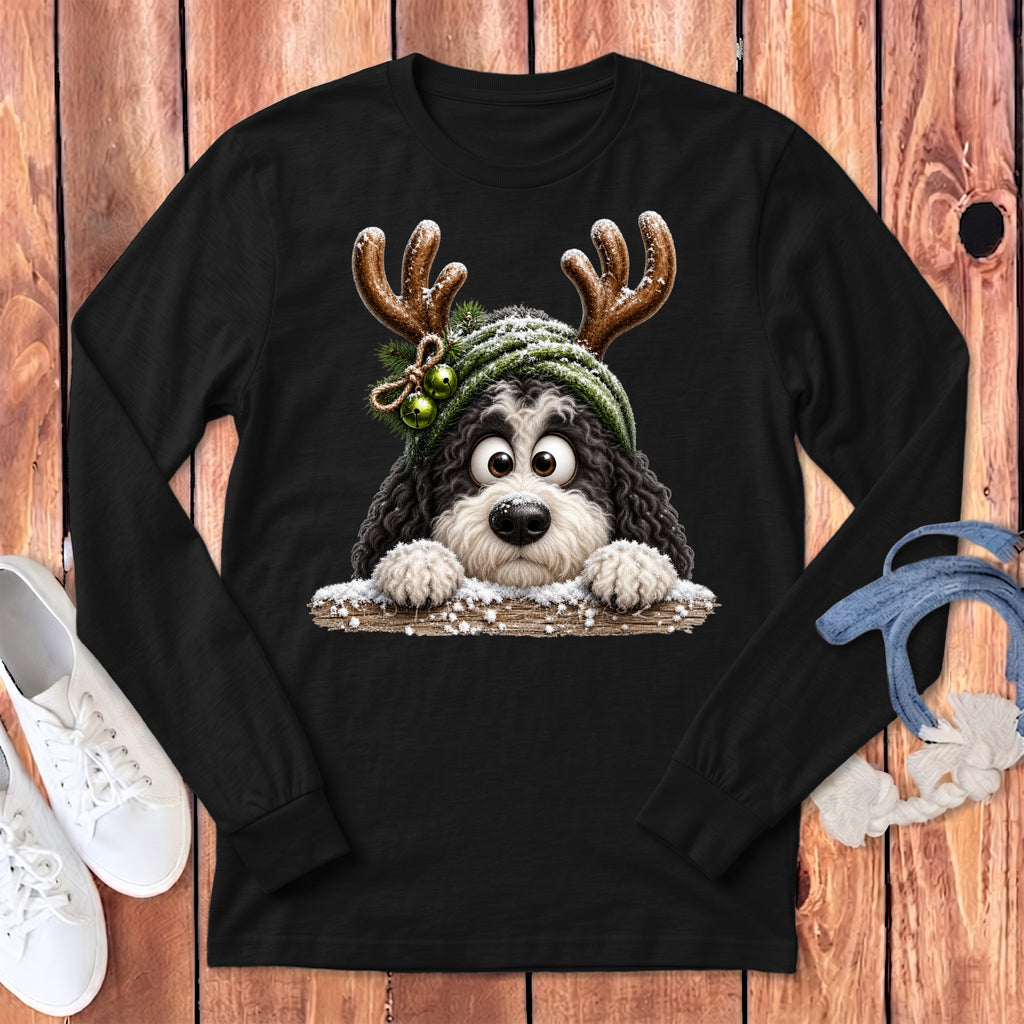 Black long sleeve t-shirt with a cartoon dog wearing reindeer antlers and a green hat.