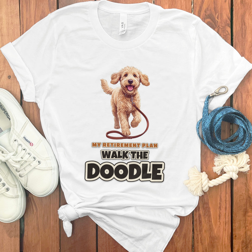 White t-shirt with doodle dog graphic and text "MY RETIREMENT PLAN WALK THE DOODLE".