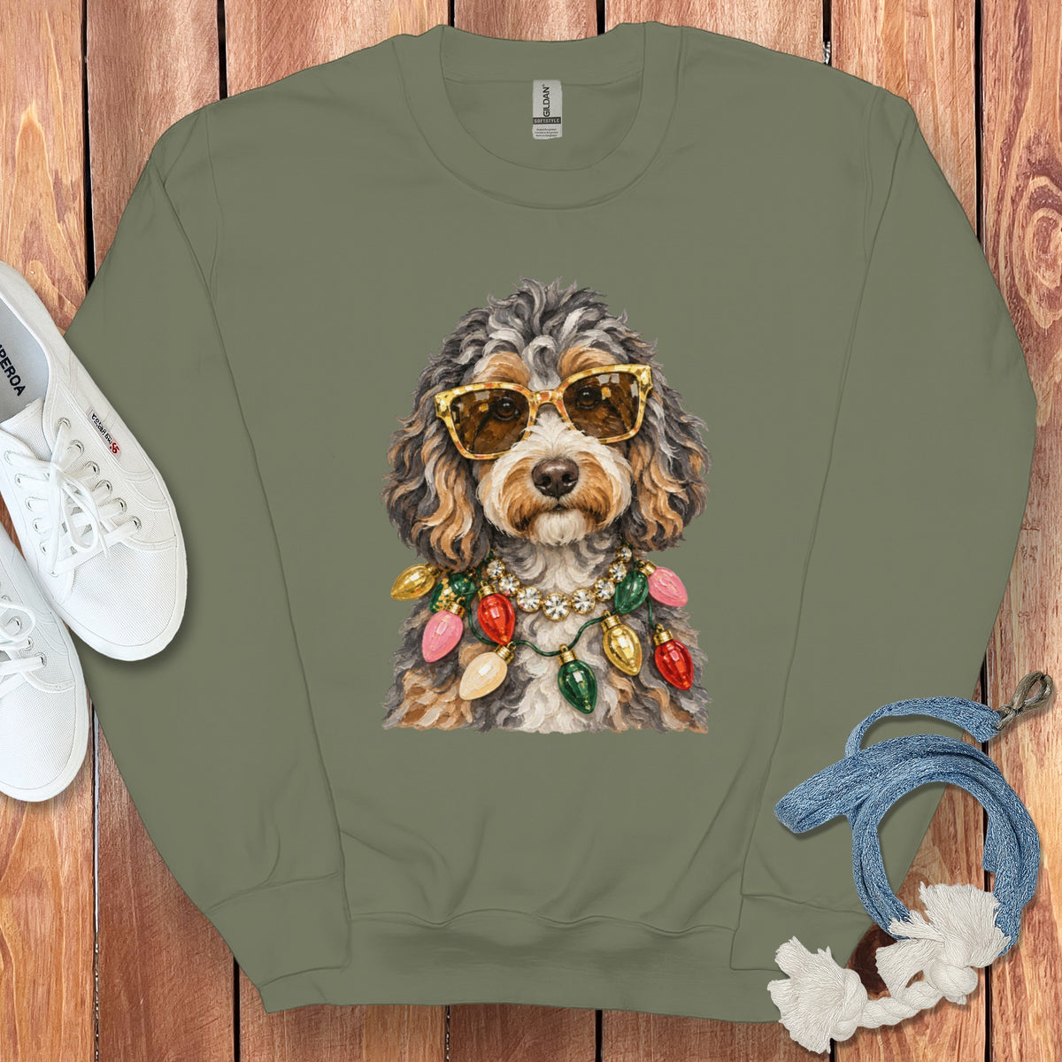 Crewneck sweatshirt with a doodle wearing sunglasses and a Christmas light necklace.